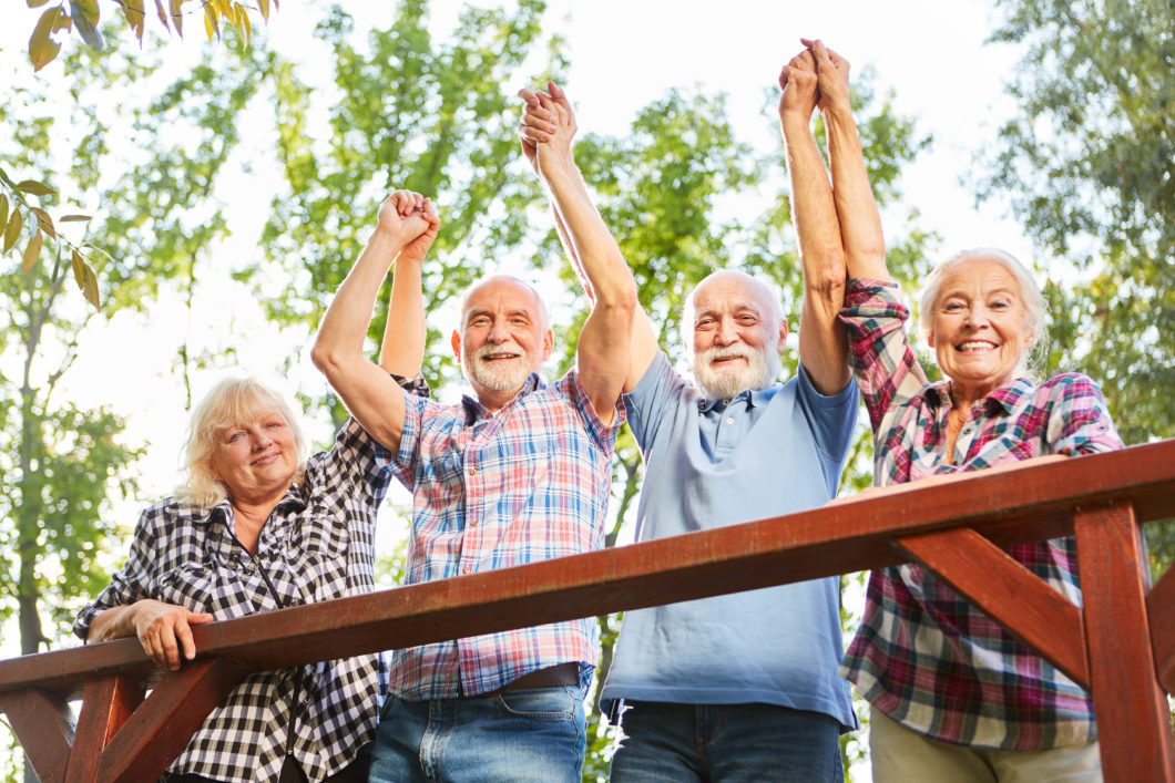 Group,of,seniors,cheers,together,on,a,summer,vacation,excursion
